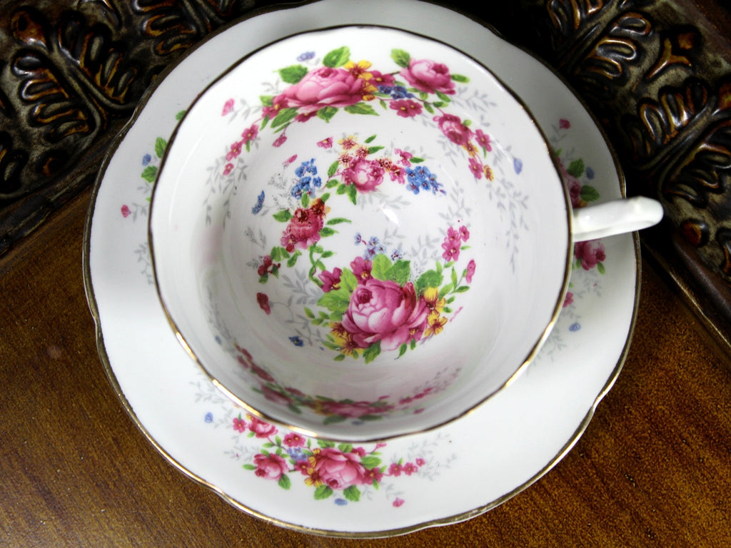 https://thevintageteacup.us/cdn/shop/products/collingwoods-teacup-saucer-english-bone-china-pink-roses-tea-cup-jteacupsthe-vintage-teacup-237511_1024x1024.jpg?v=1682009478