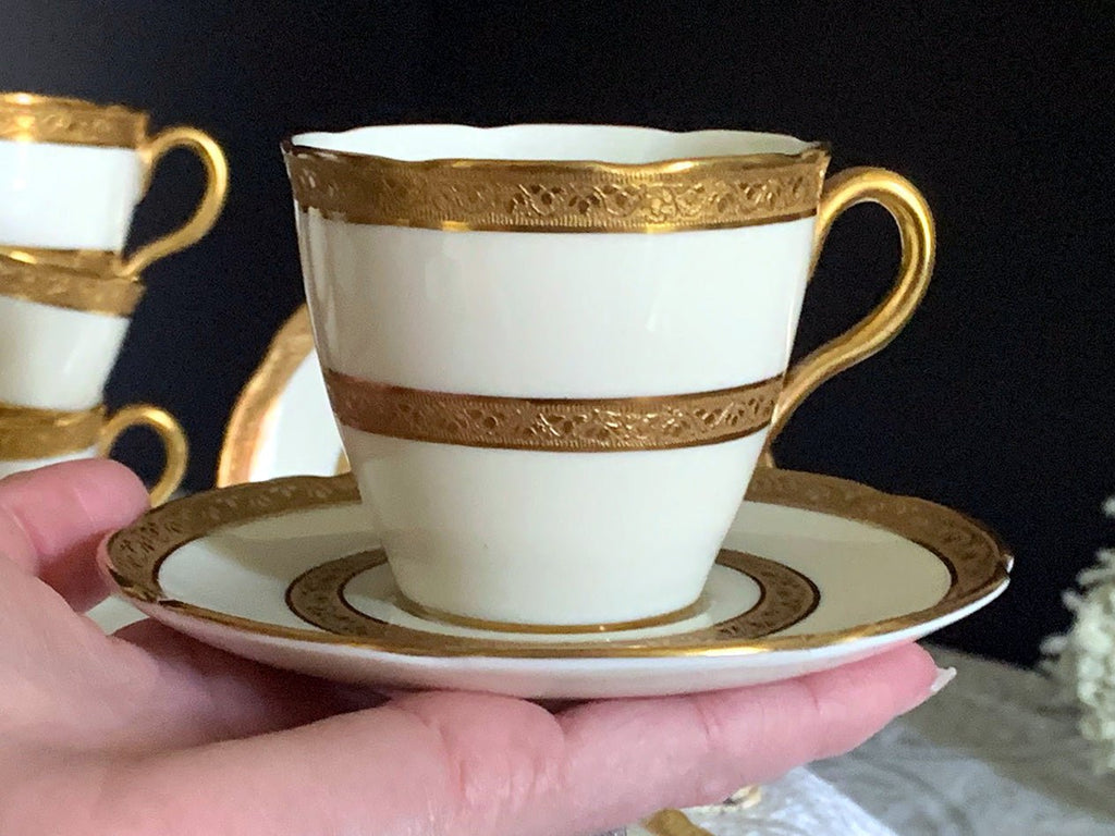 https://thevintageteacup.us/cdn/shop/products/demitasse-royal-doulton-cups-saucers-the-balmoral-6-sets-vintage-demi-teacups-jteacupsthe-vintage-teacup-111400_1024x1024.jpg?v=1682009544