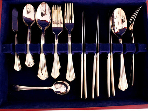 https://thevintageteacup.us/cdn/shop/products/international-gold-tone-flatware-set-35-piece-with-case-cutlery-in-wood-box-15400antique-vintagethe-vintage-teacup-736065_large.jpg?v=1682009673
