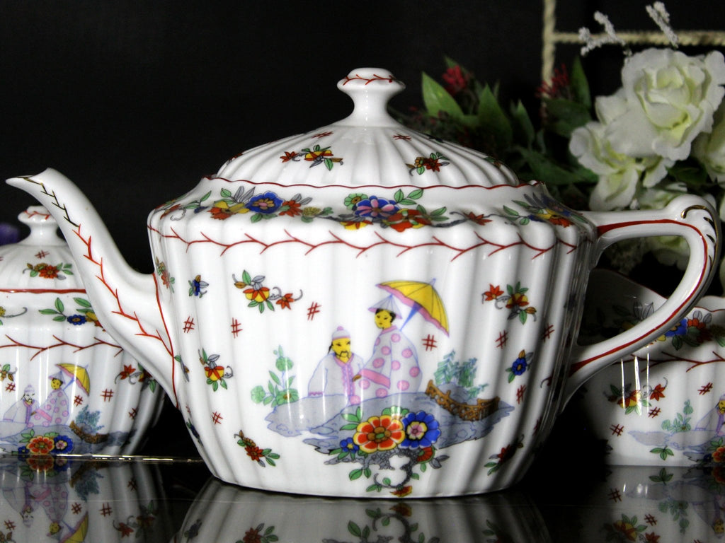 https://thevintageteacup.us/cdn/shop/products/kpm-vintage-teapot-sugar-and-creamer-tea-pot-made-in-germany-jteapotsthe-vintage-teacup-247375_1024x1024.jpg?v=1682009687
