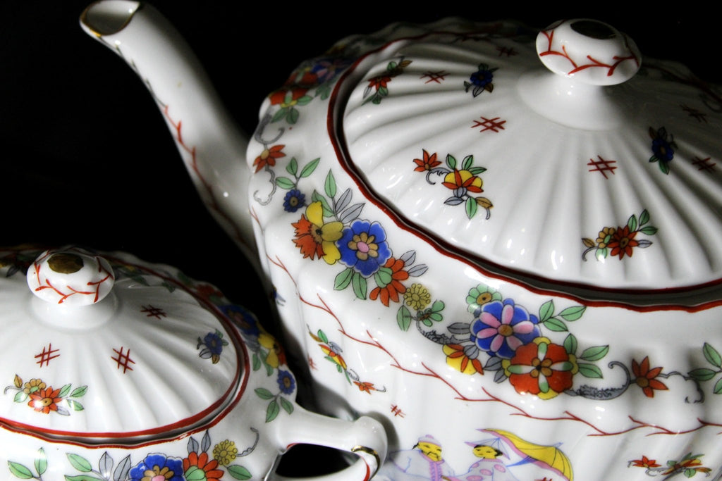 https://thevintageteacup.us/cdn/shop/products/kpm-vintage-teapot-sugar-and-creamer-tea-pot-made-in-germany-jteapotsthe-vintage-teacup-611500_1024x1024.jpg?v=1682009687