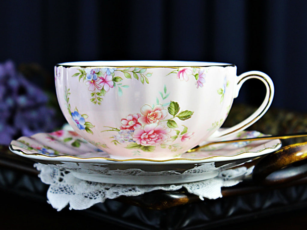 https://thevintageteacup.us/cdn/shop/products/new-teacup-saucer-soft-pink-chintz-floral-tea-cup-made-in-china-18231teacupsthe-vintage-teacup-147874_1024x1024.jpg?v=1682009770