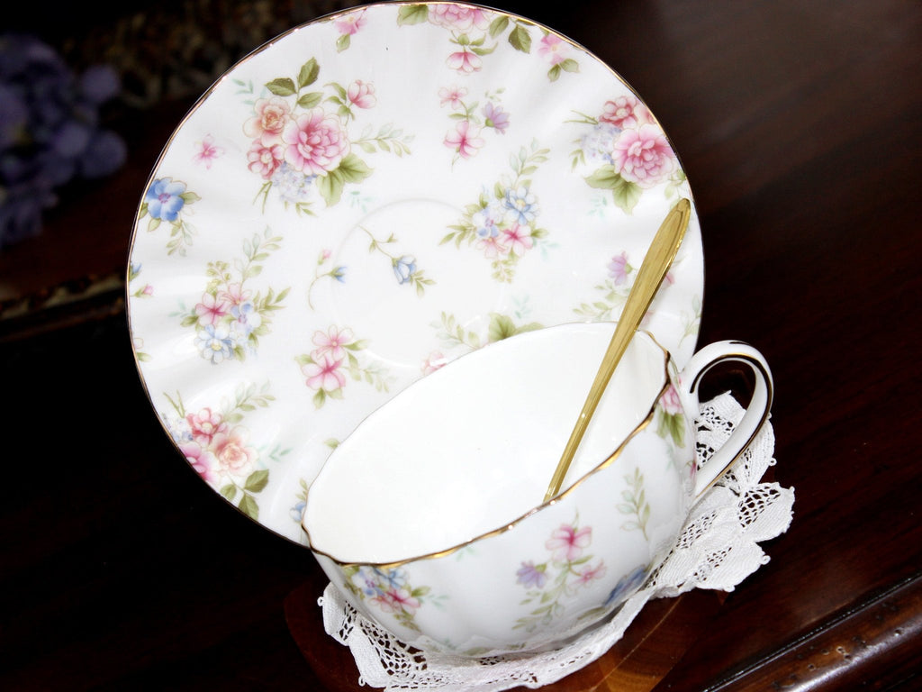 https://thevintageteacup.us/cdn/shop/products/new-teacup-saucer-white-chintz-floral-tea-cup-made-in-china-18232teacupsthe-vintage-teacup-583378_1024x1024.jpg?v=1682056400