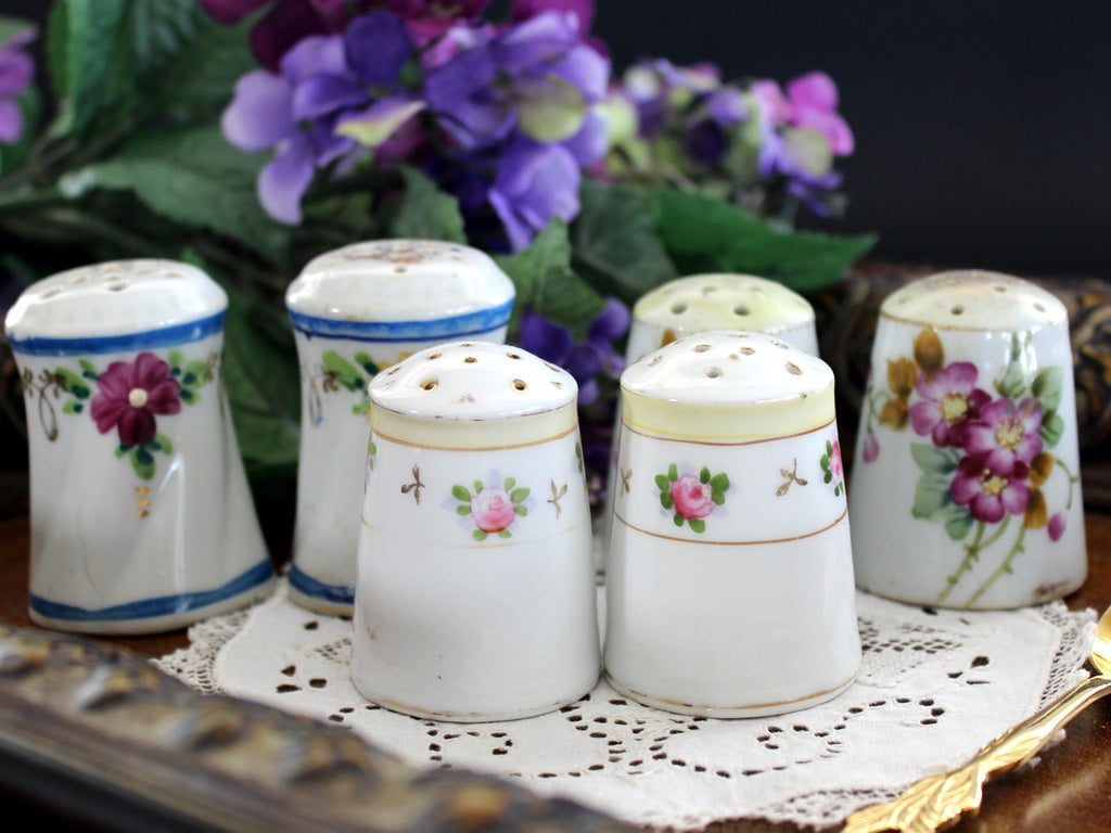 https://thevintageteacup.us/cdn/shop/products/salt-and-pepper-shakers-3-sets-hand-painted-china-vintage-salt-and-pepper-made-in-japan-1950s-13363accessoriesthe-vintage-teacup-224913_1024x1024.jpg?v=1682009978